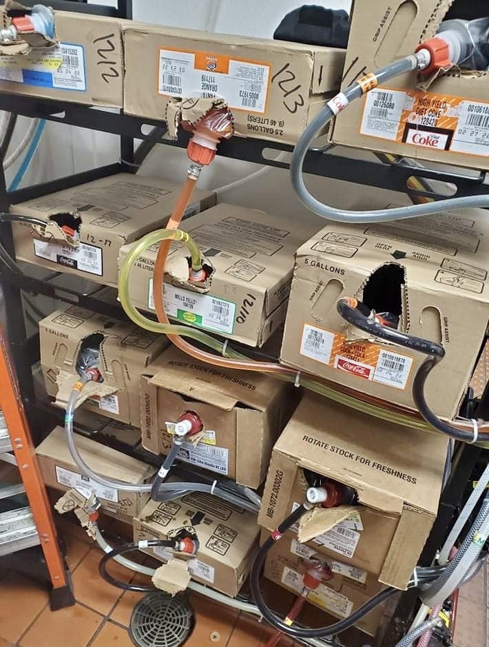 Boxes with soda linked to a soda fountain