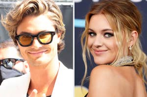 Chase Stokes wears a white suit with a black shirt and black glasses with orange tint. Kelsea Ballerini wears a black halter-style dress with layered diamond necklaces and diamond hoop earrings.