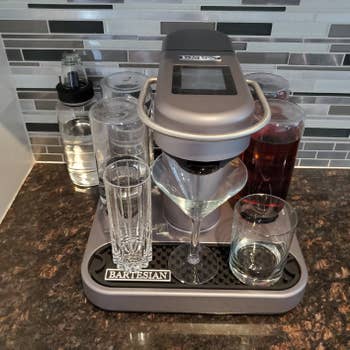 reviewer's machine set up with martini glass underneath