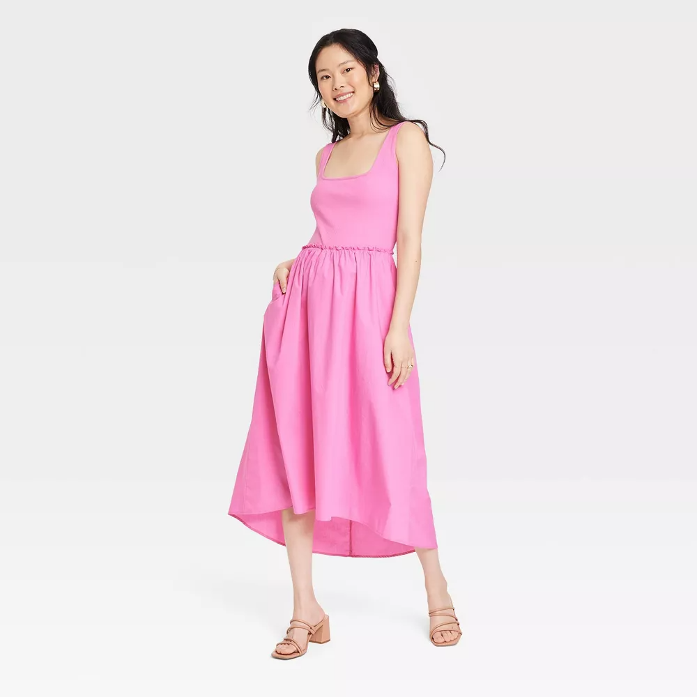 the sleeveless pink dress