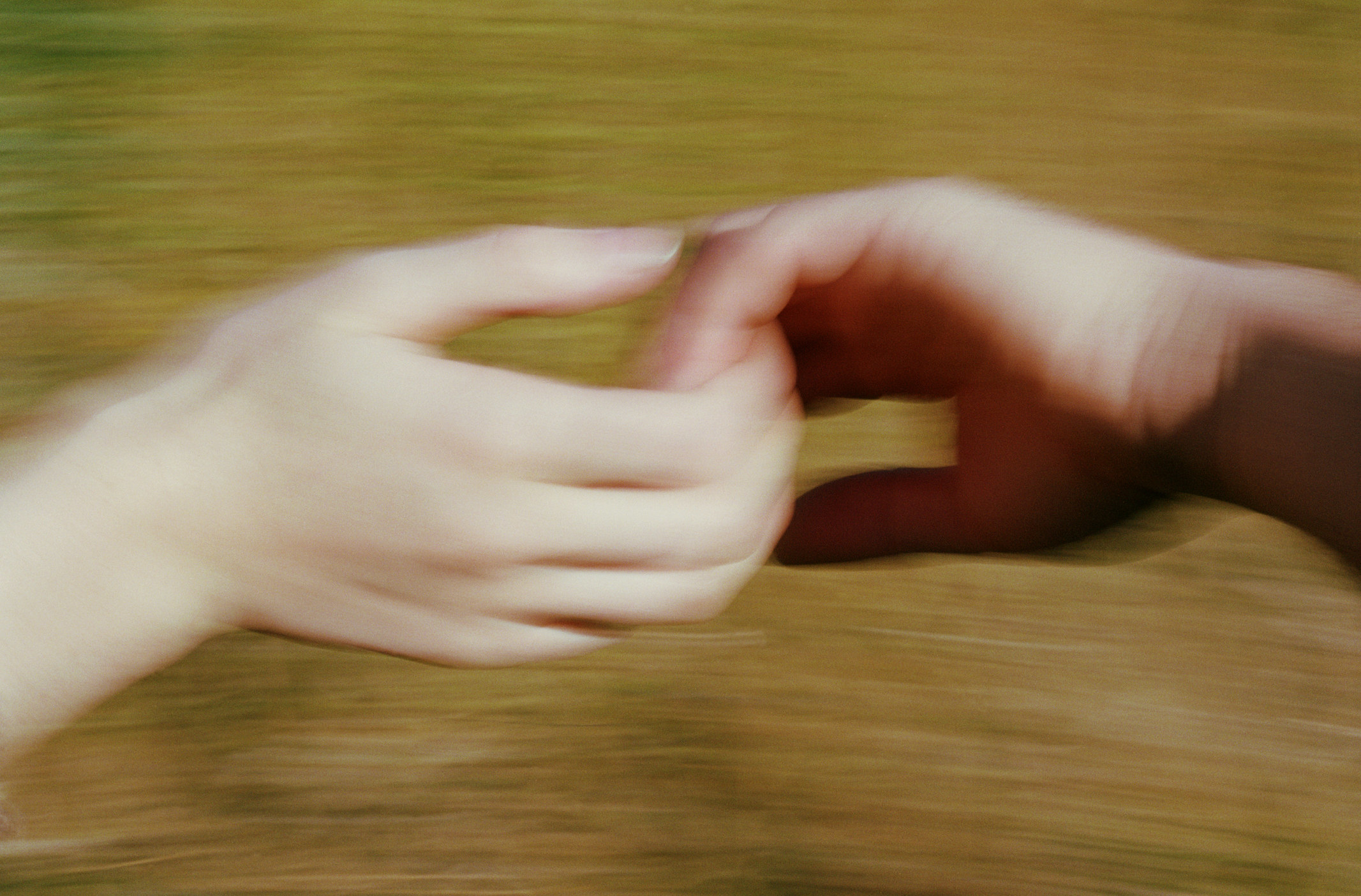 Hands holding by the fingers