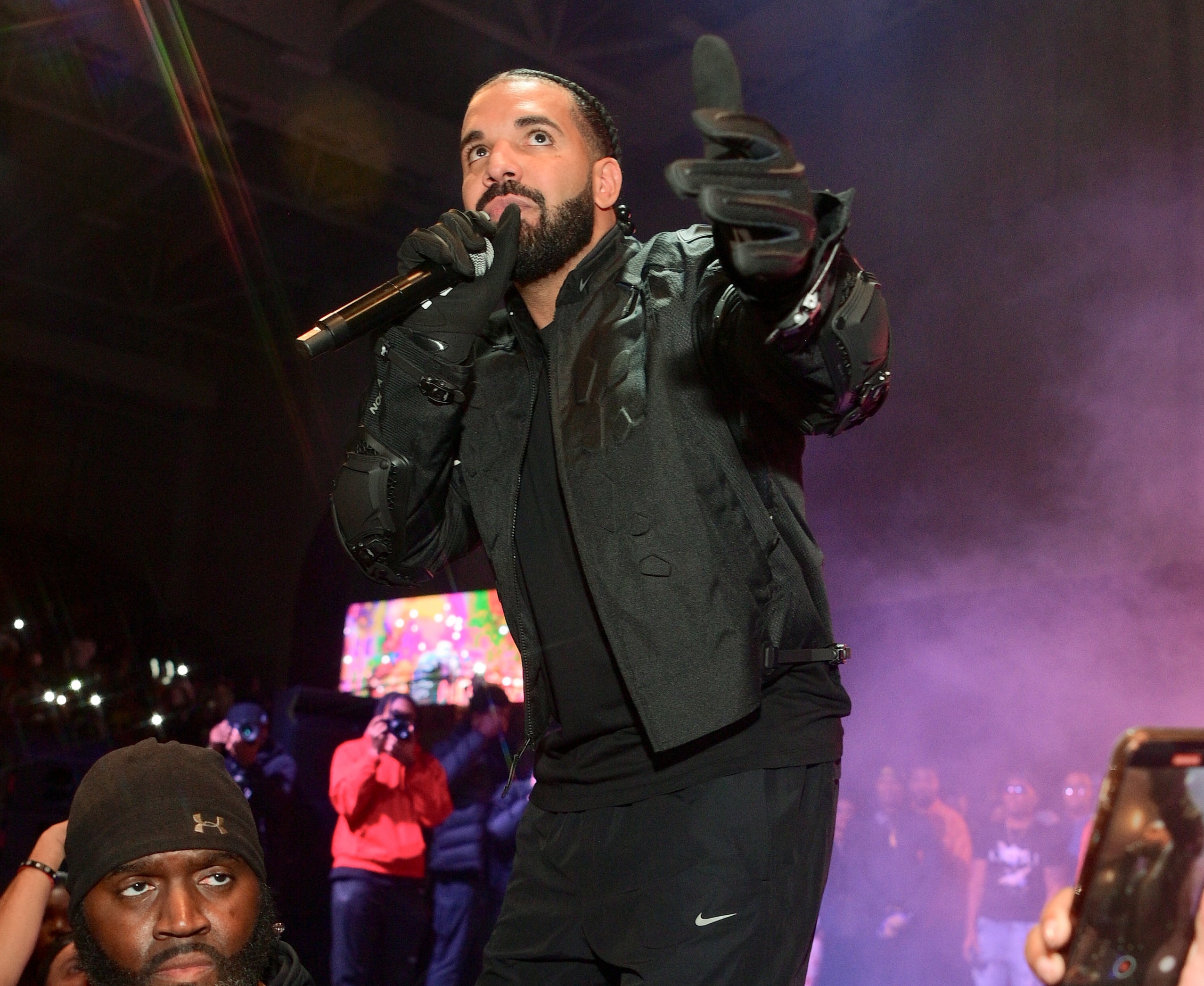 A closeup of Drake performing