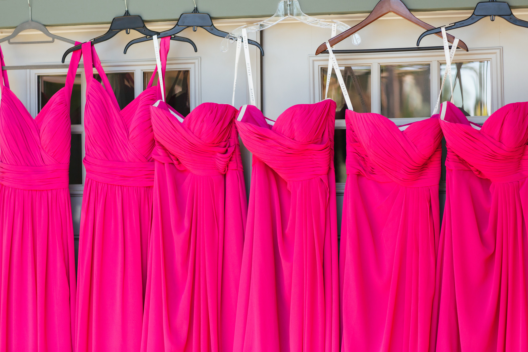 bridesmaids dresses hanging outside