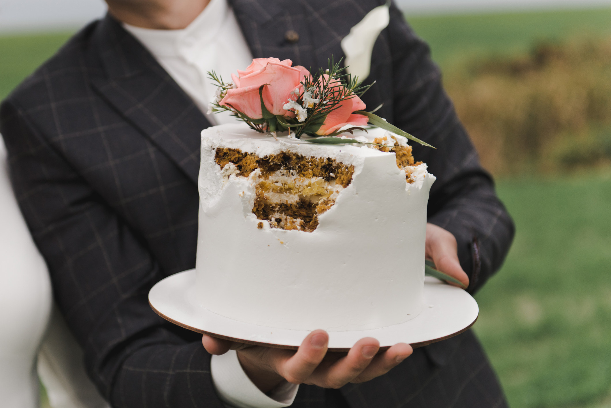 small cake with chunks taken out of the sides