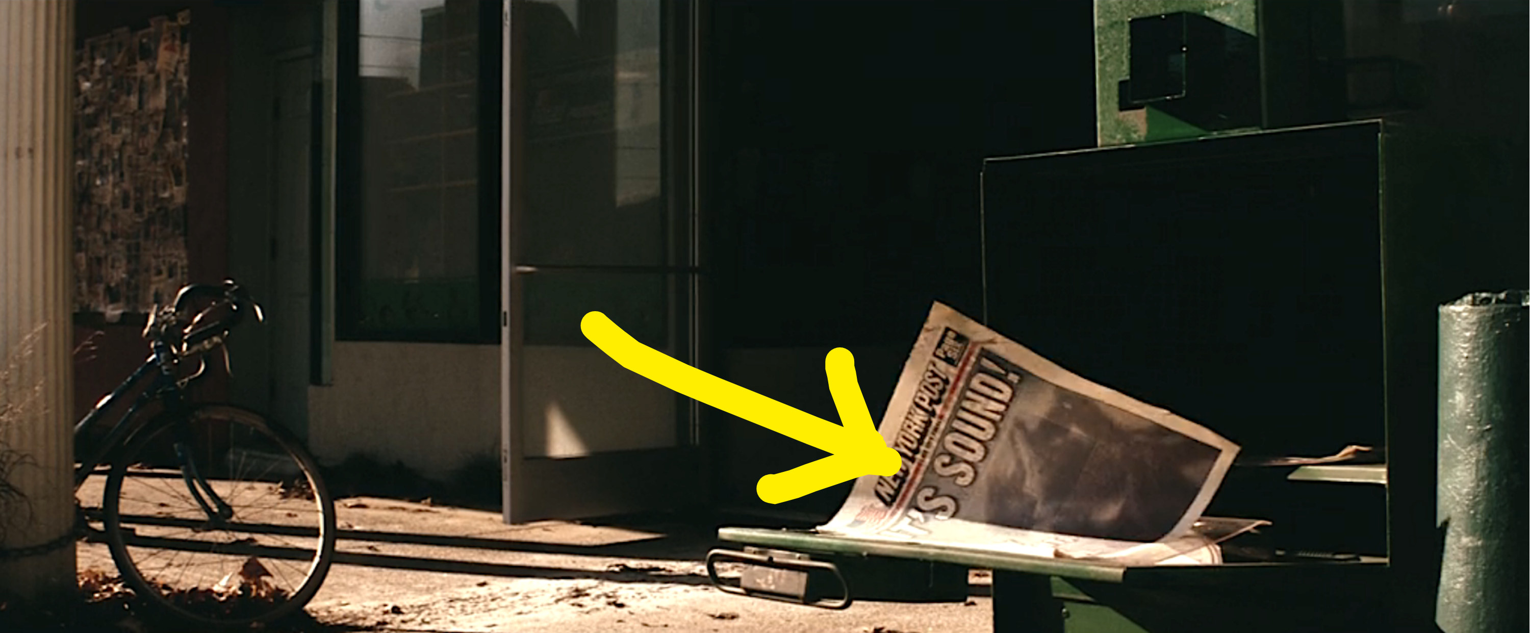 arrow pointing to the newspaper