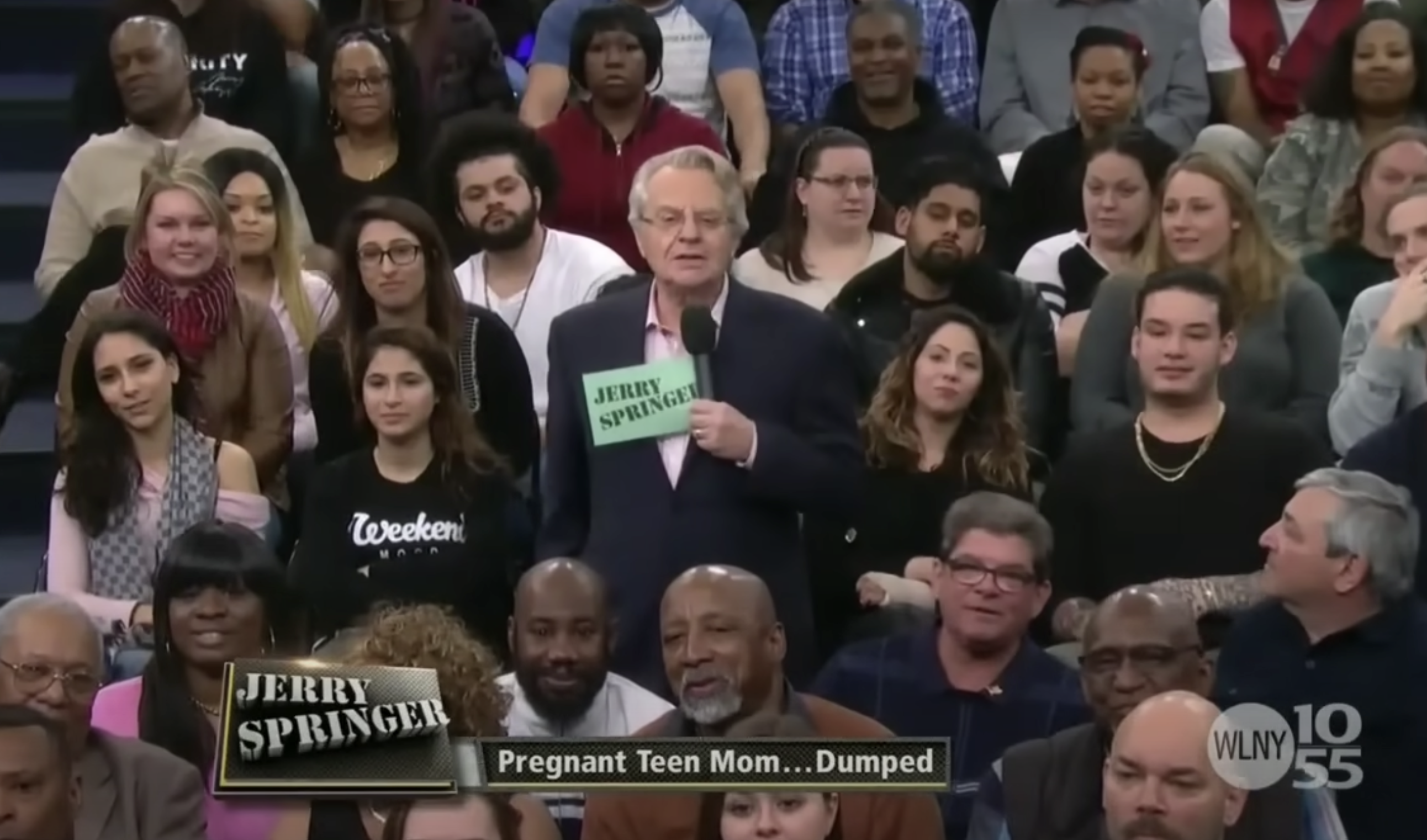 Jerry Springer standing in the audience with the chyron &quot;Pregnant Teen Mom Dumped&quot;