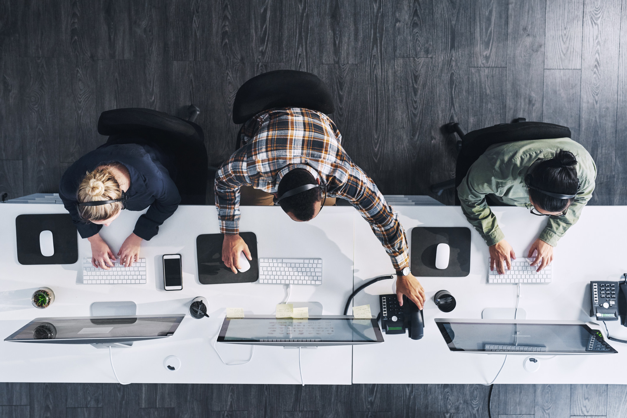 Coworkers working at their computers