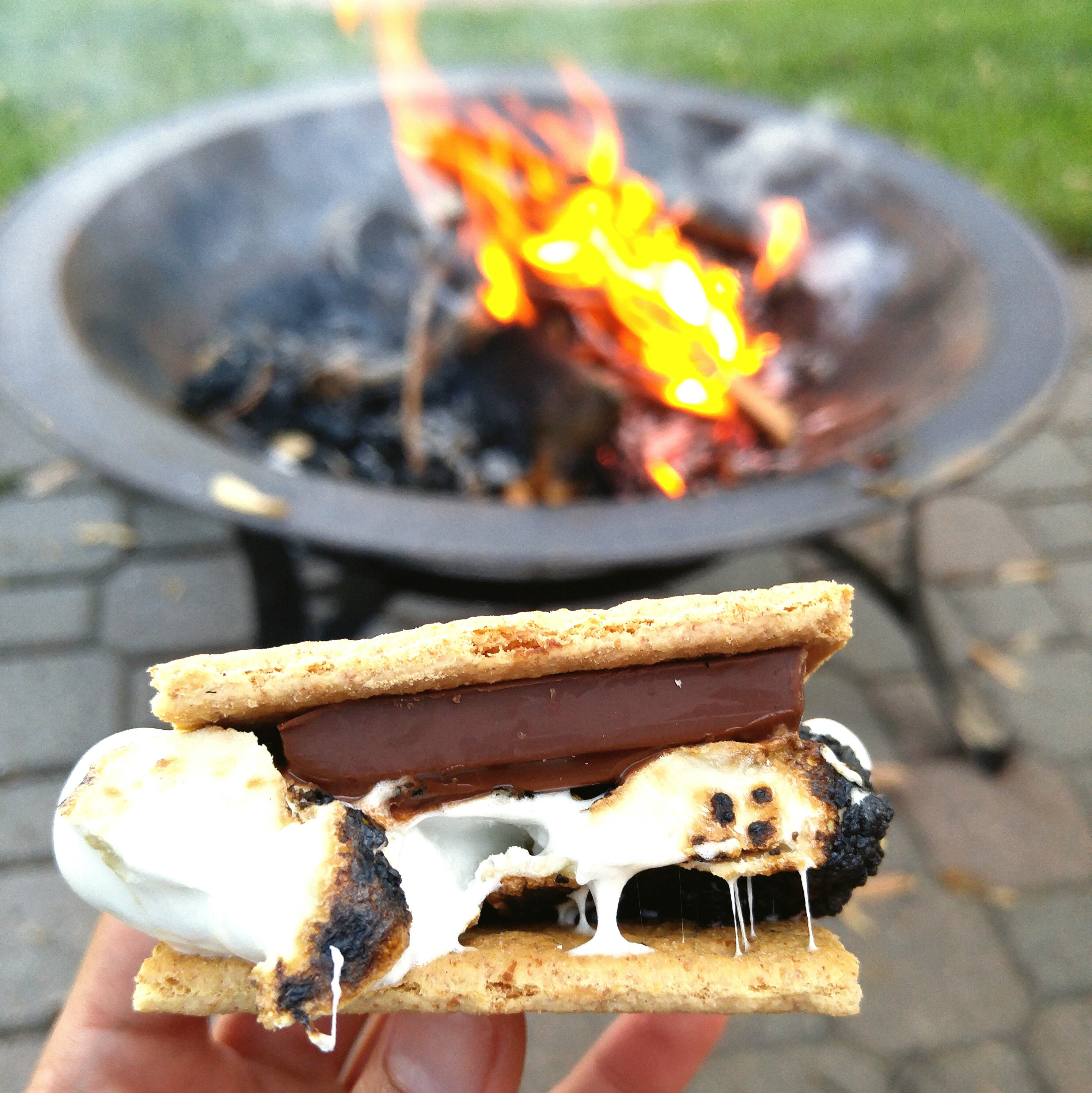 Close-up of s&#x27;more before a firepit