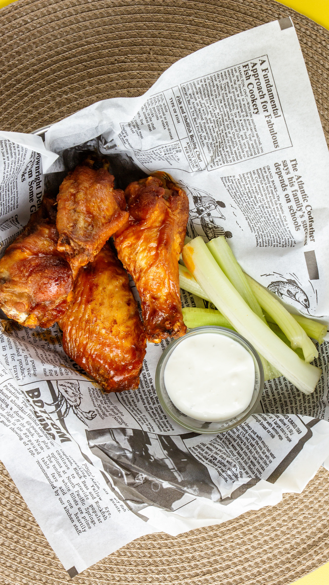 Buffalo wings with celery and dipping sauce