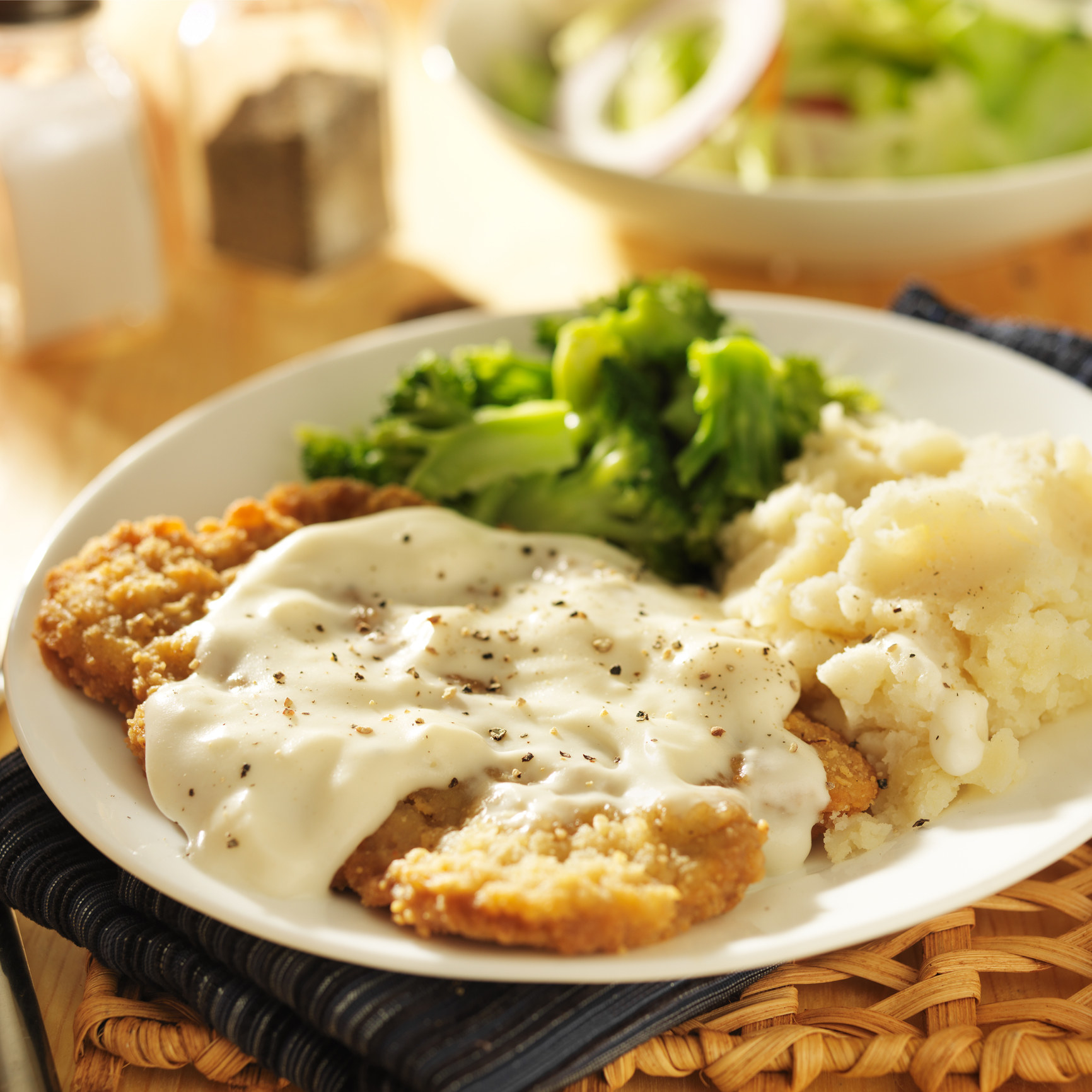 Country fried steak with Southern-style peppered milk gravy