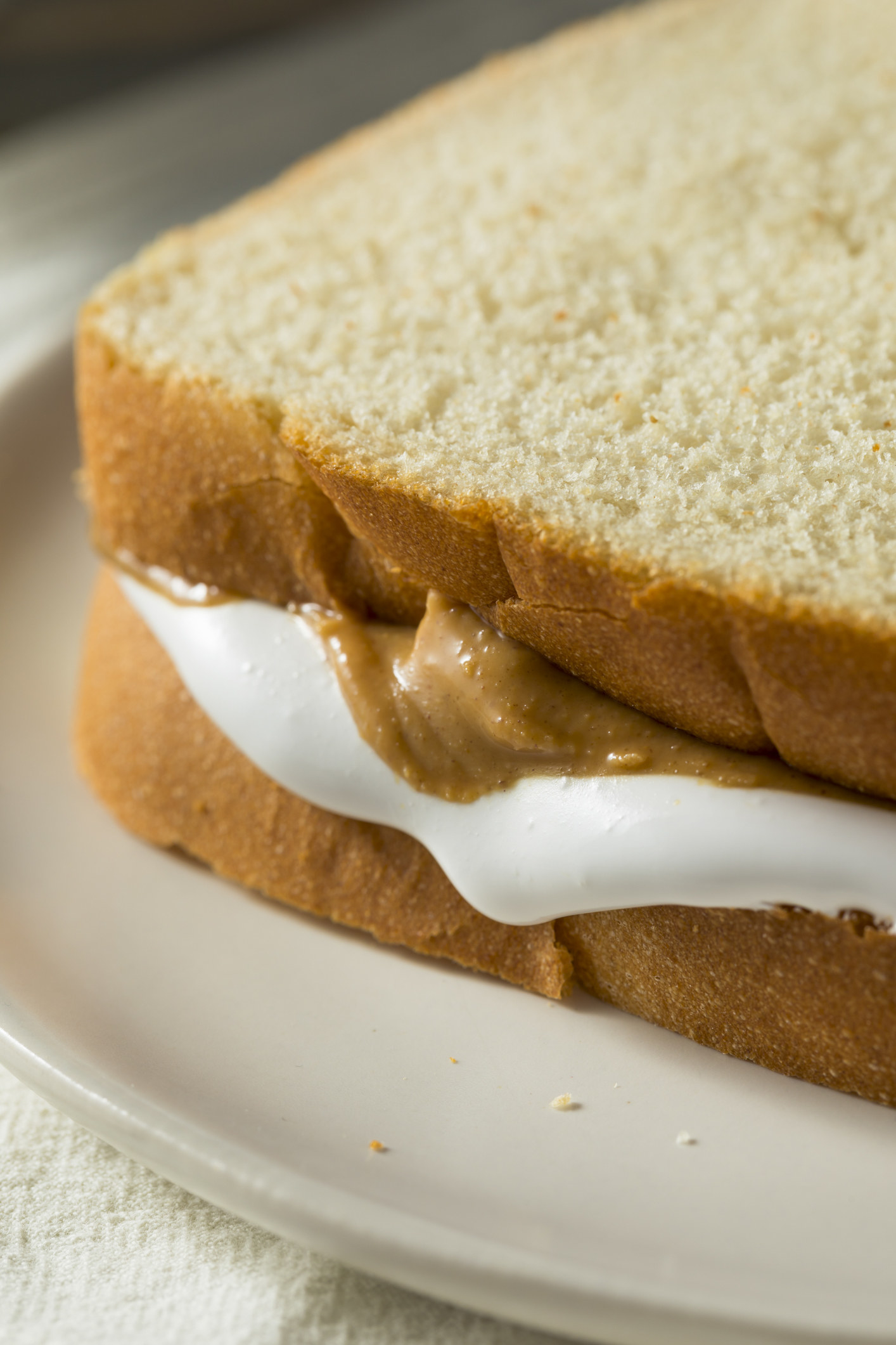 A peanut butter and marshmallow cream sandwich