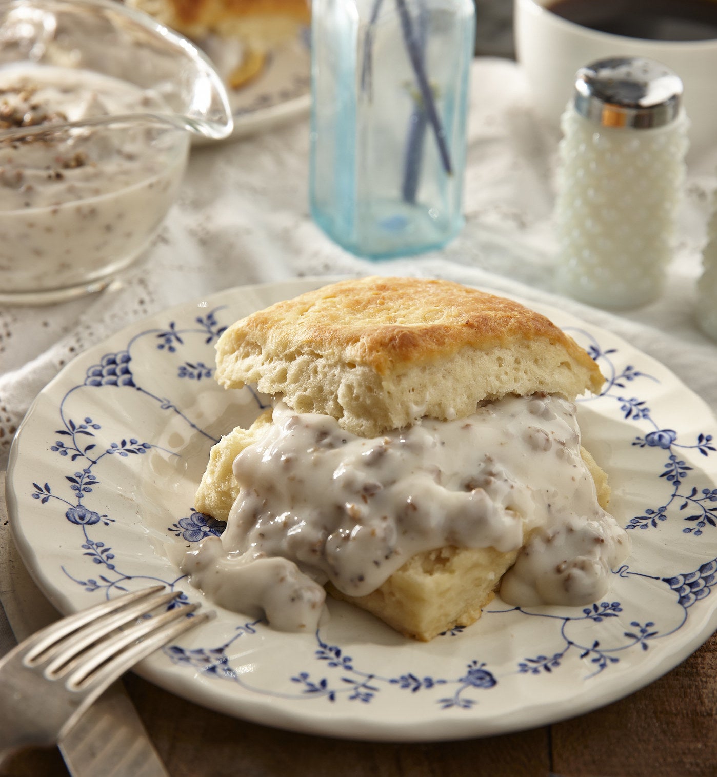 Homemade biscuits and gravy with coffee