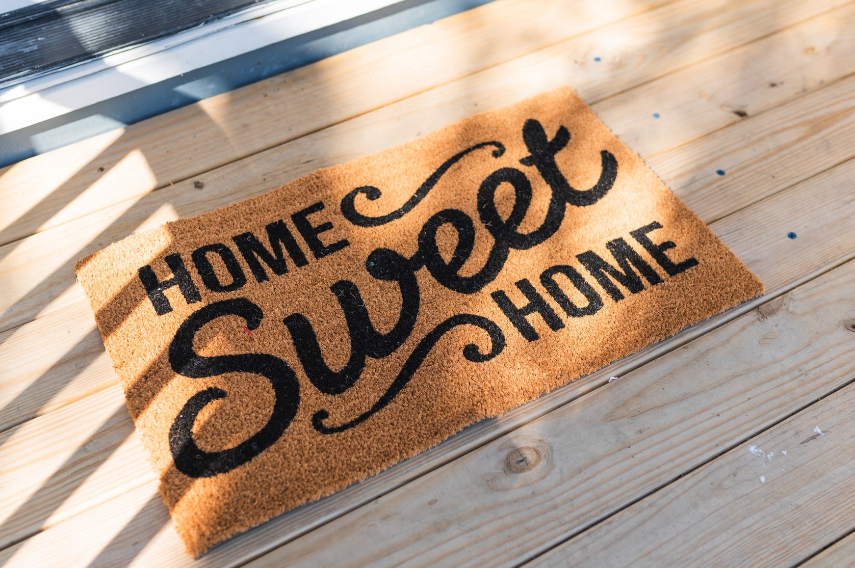 welcome mat that says home sweet home