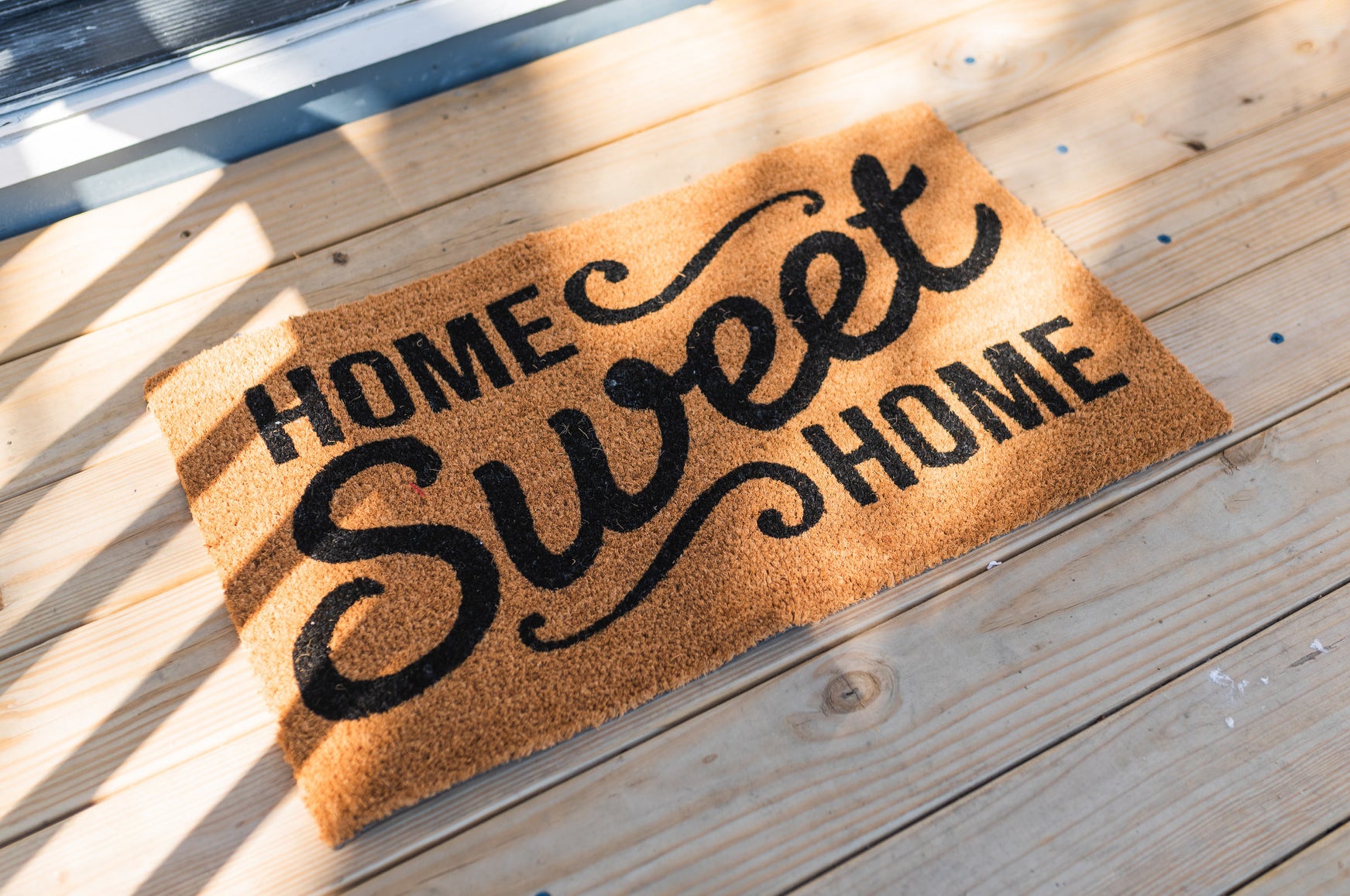 welcome mat that says home sweet home