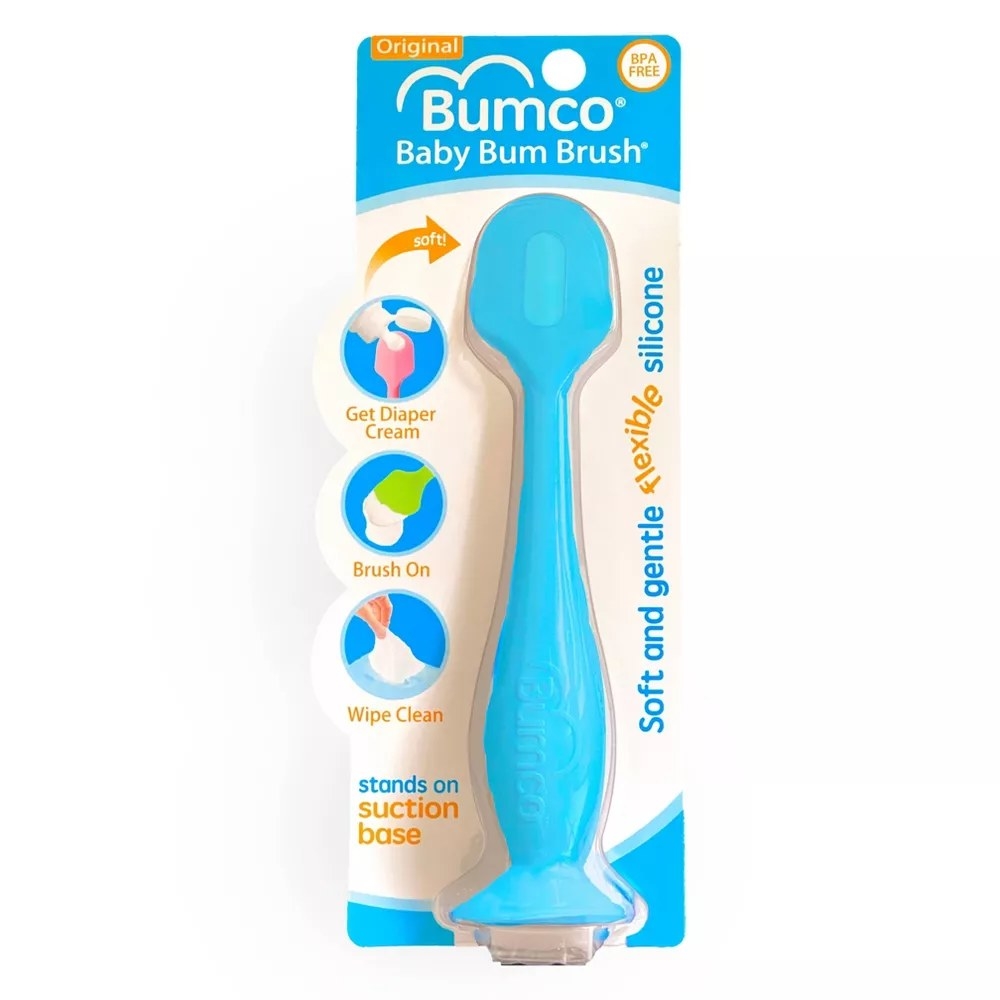 Blue silicone bum brush in white packaging