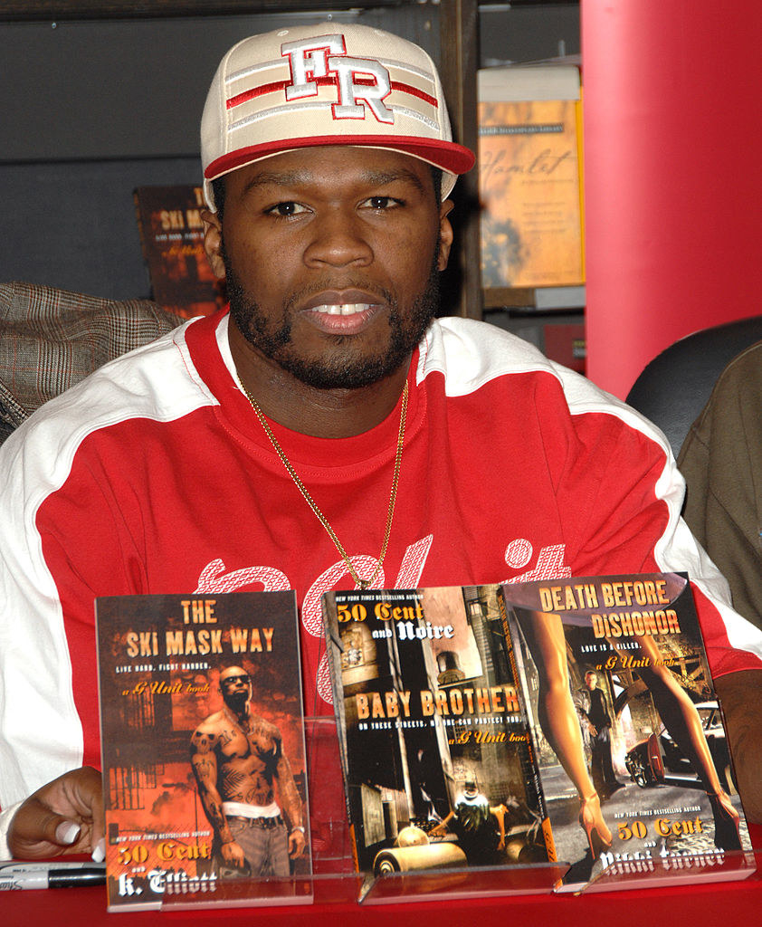 50 cent with three of his books