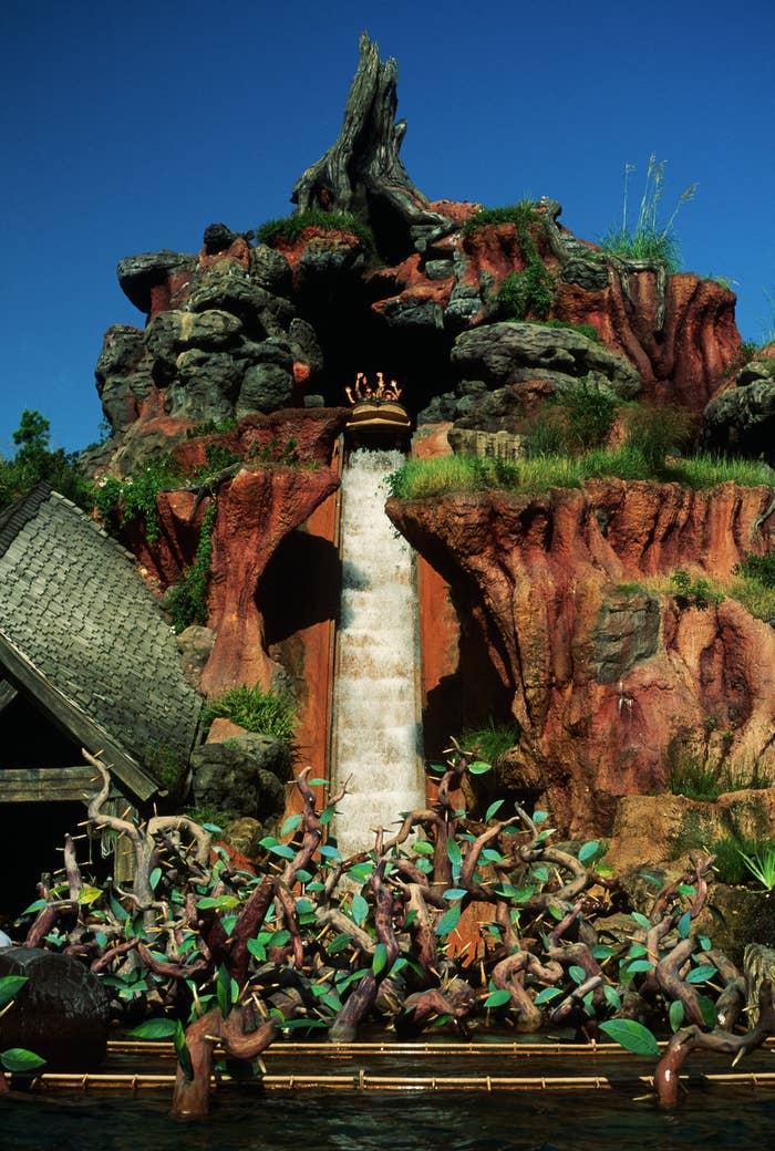 A car full of people about to go over the falls on the Splash Mountain ride