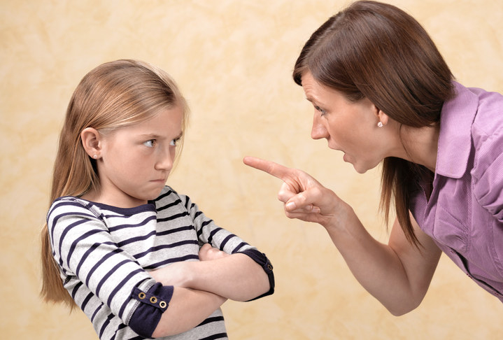 mom scolding daughter