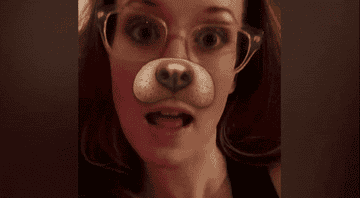 Singer Ingrid Michaelson with the Snapchat dog filter