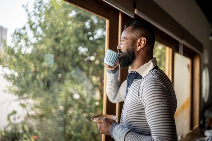 a person drinking coffee