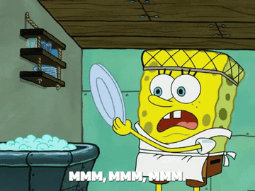 a gif of spongebob squarepants scrubbing dishes