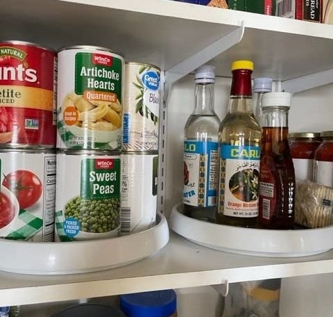 Reviewer image of cans and condiments on lazy Susans
