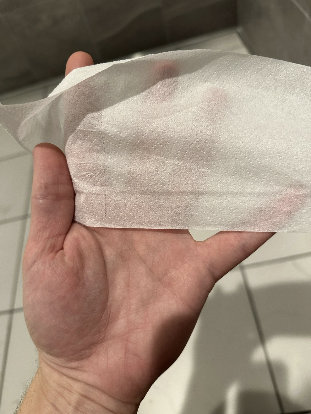 The toilet paper is so thin, you can see the person&#x27;s hand on the other side of it