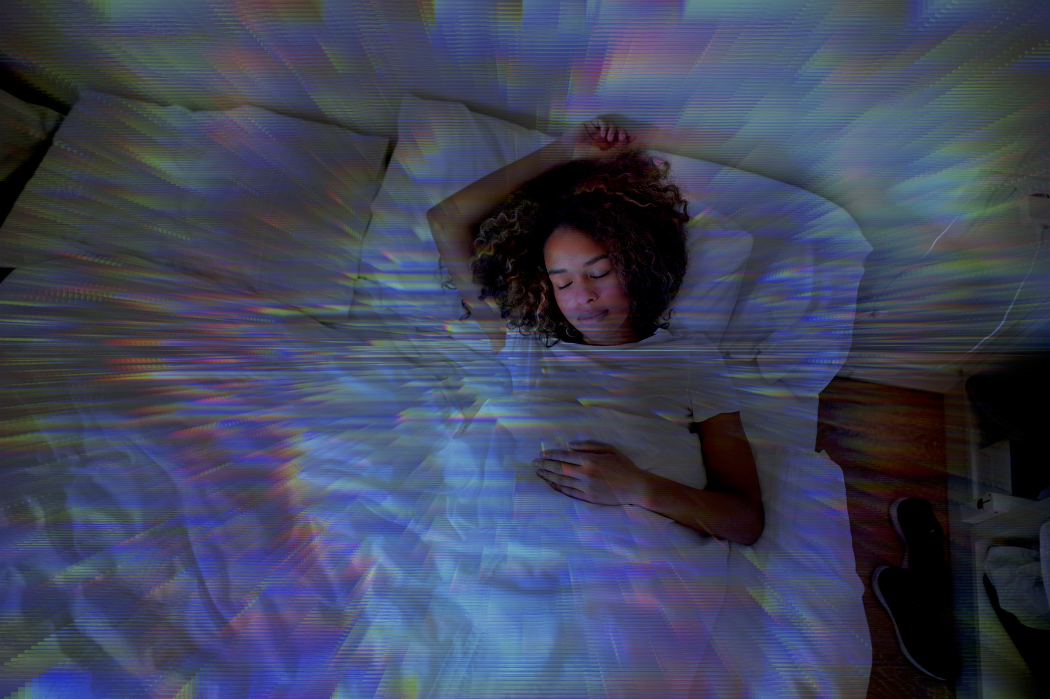 woman sleeping with a lights surrounding her