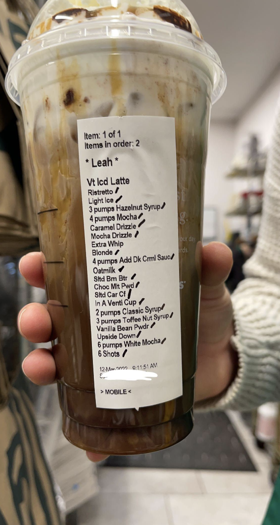The drink has so many requests on it that the receipt covers the entire cup