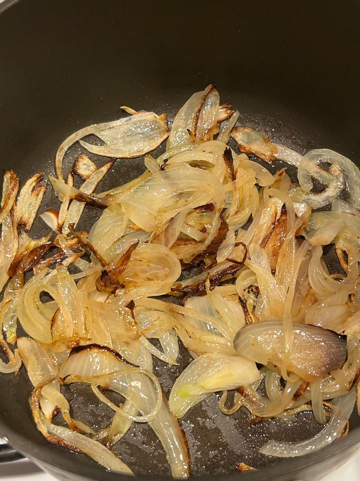 Cooked onions in a pot