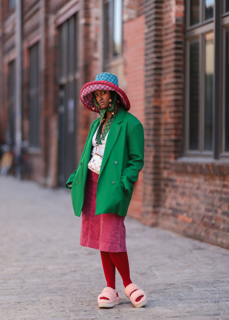 Woman wearing a bold multicolored outfit to Berlin fashion week in 2021