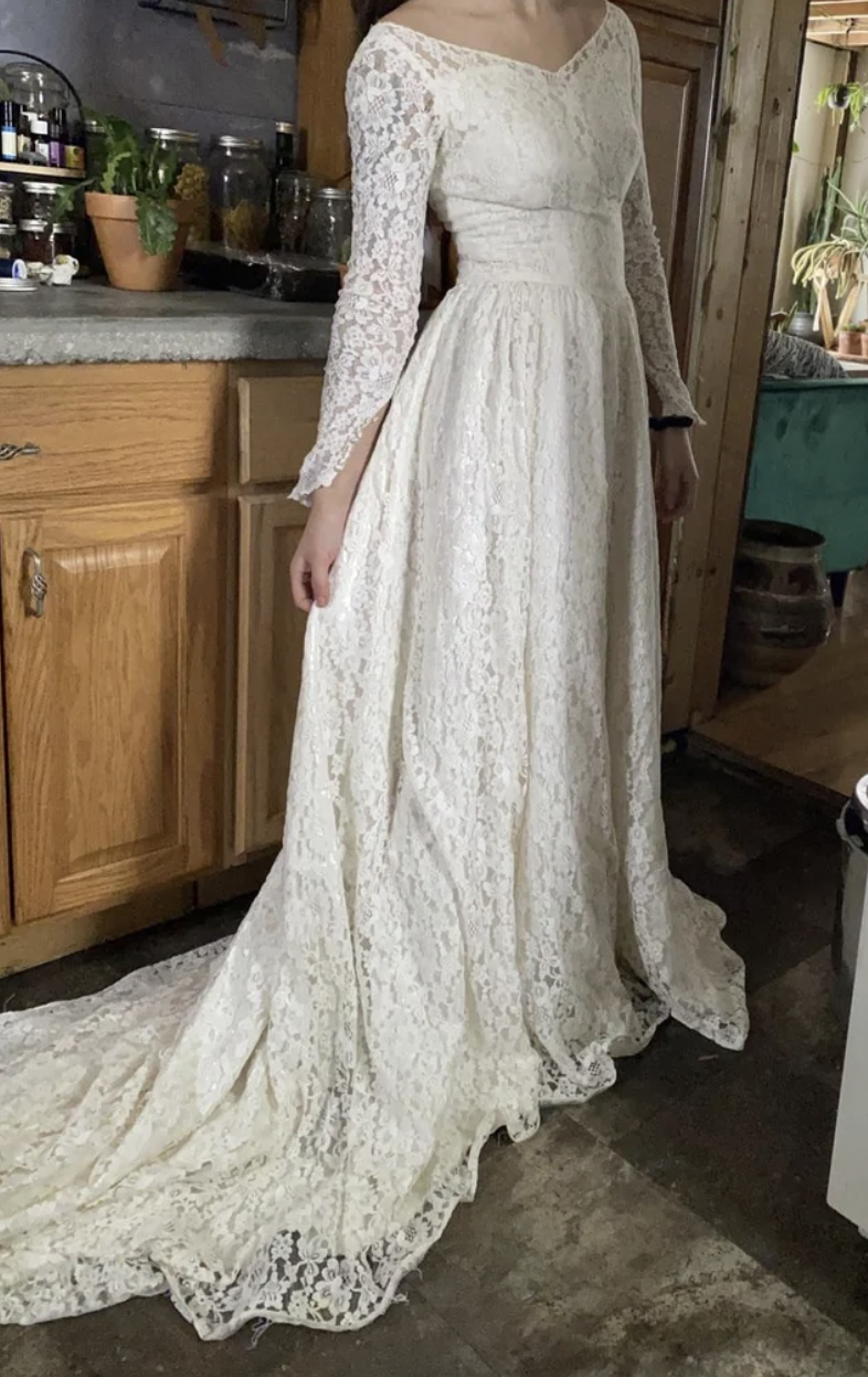 A woman modeling a wedding dress