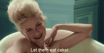 Kirsten Dunst as Marie Antoinette saying &quot;let them eat cake.&quot;