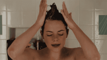 Emma Stone singing in the shower.