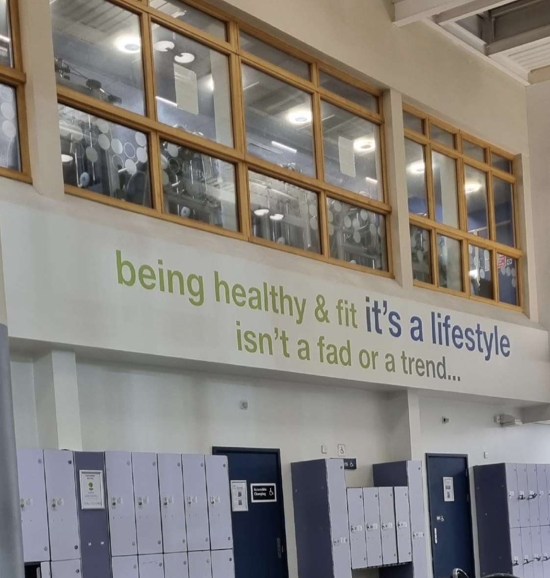 Sign at gym: &quot;being healthy &amp;amp; fit it&#x27;s a lifestyle isn&#x27;t a fad or a trend&quot;