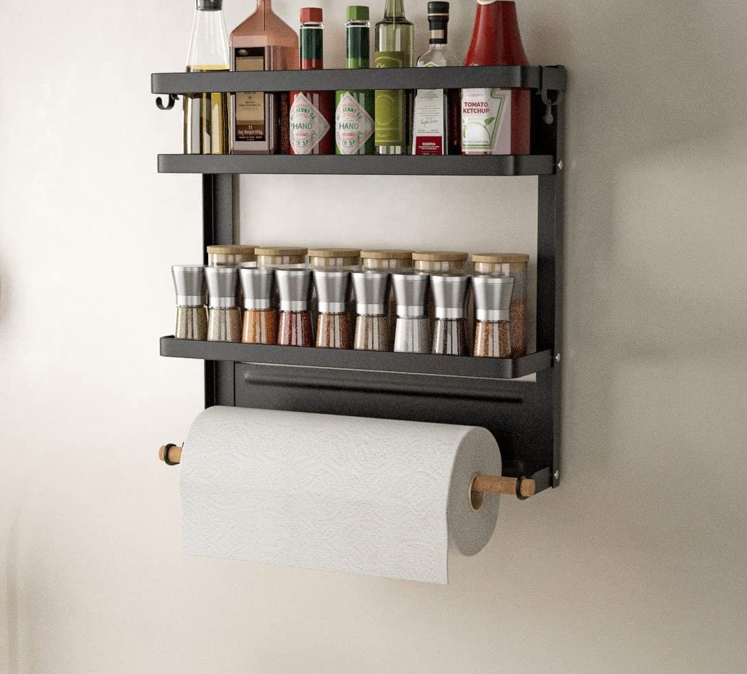 a spice rack shelf with a paper towel roll holder mounted to a roll