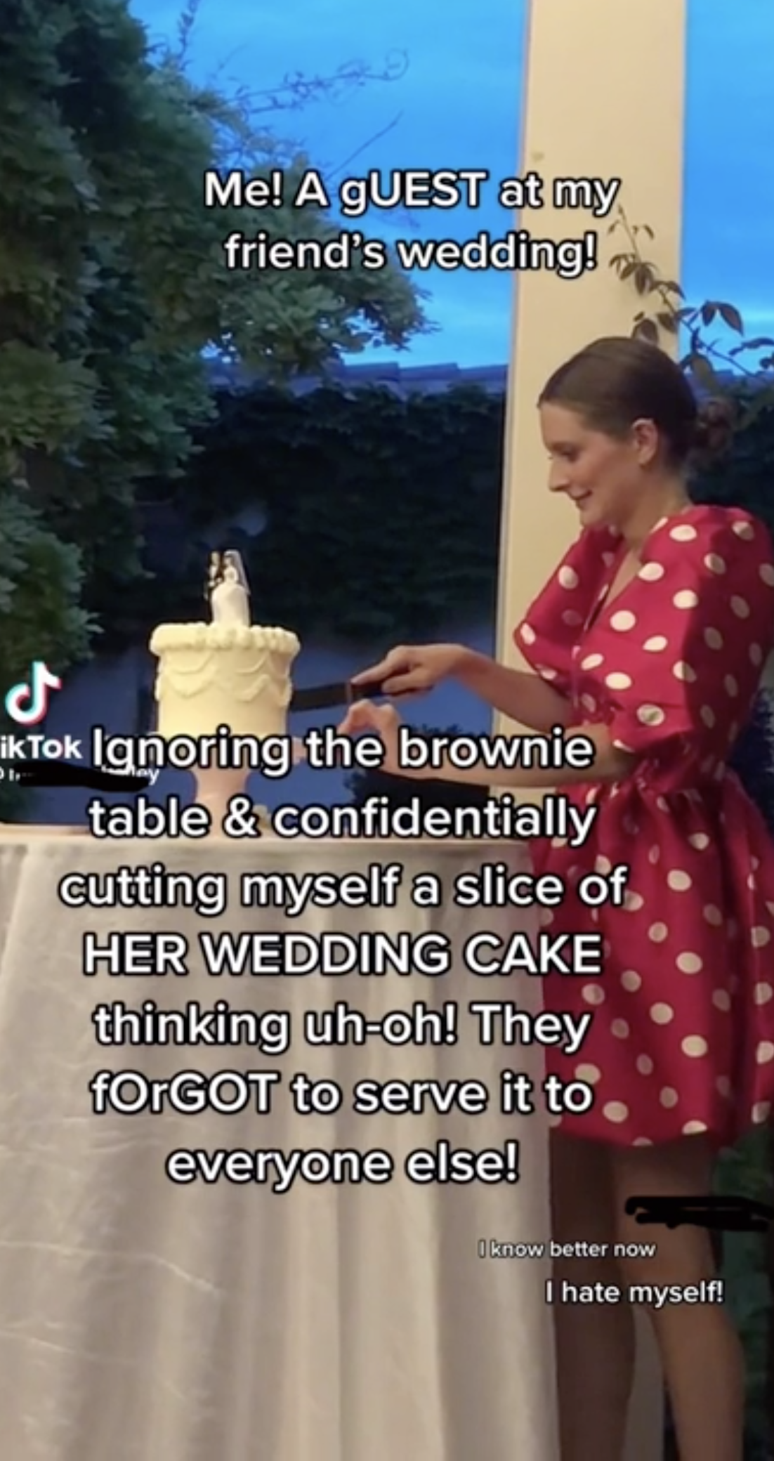 A woman cutting a piece of the bride and groom&#x27;s cake