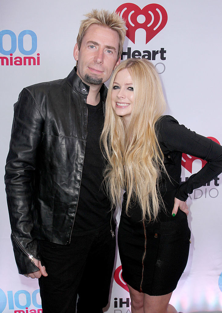 Chad and Avril standing together