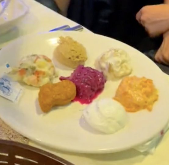 Different &quot;dips&quot; on a plate next to the nugget, different colors and textures
