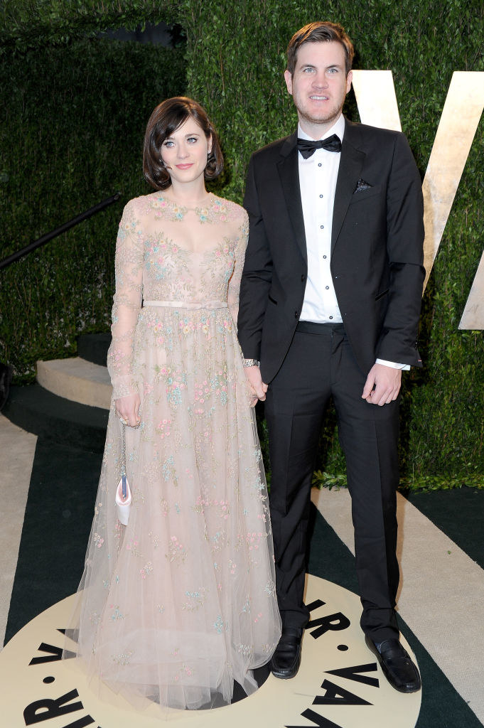 Zooey and Jamie holding hands