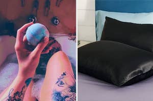 Reviewer holding their bath bomb while in the bathtub, and two black satin pillows on a bed
