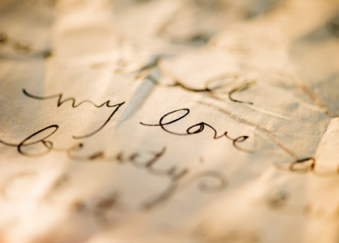 photo of a love letter on old paper