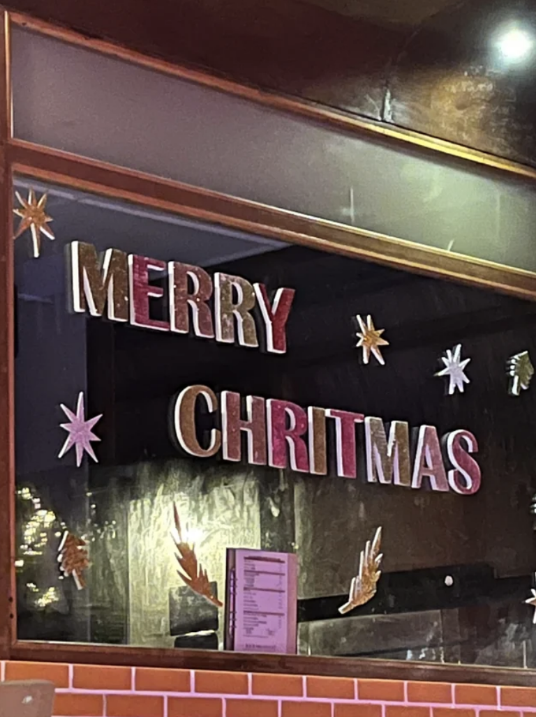 Sign that reads, &quot;MERRY CHRITMAS&quot;