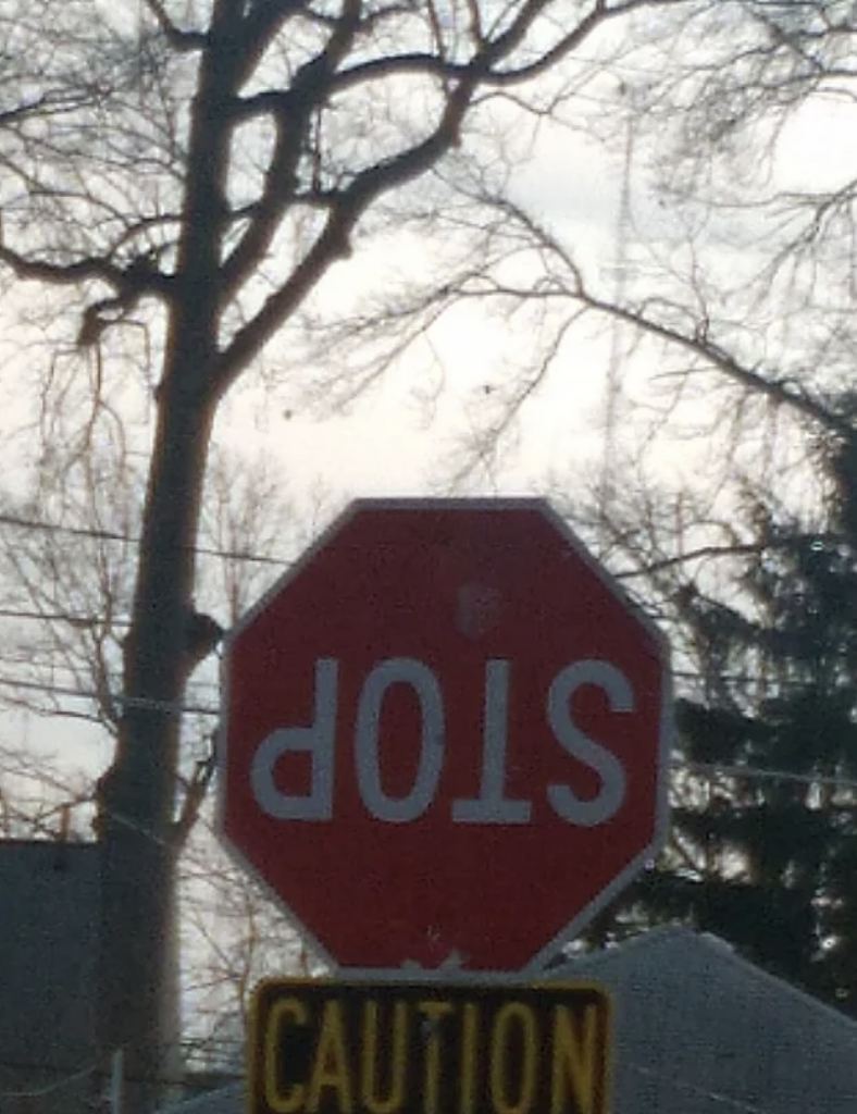 Upside-down stop sign