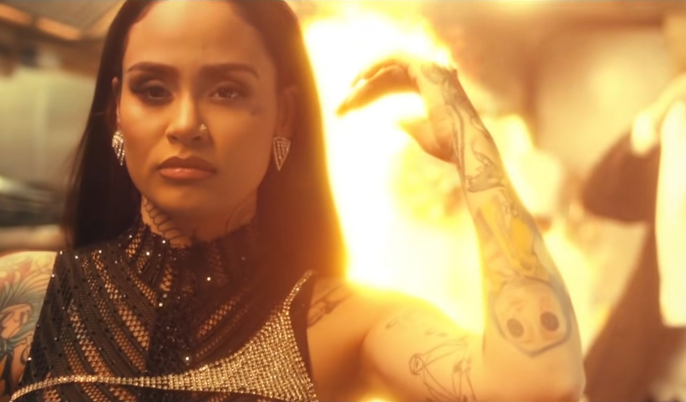 Kehlani walking away from a burning fire in &quot;Good Thing&quot; music video
