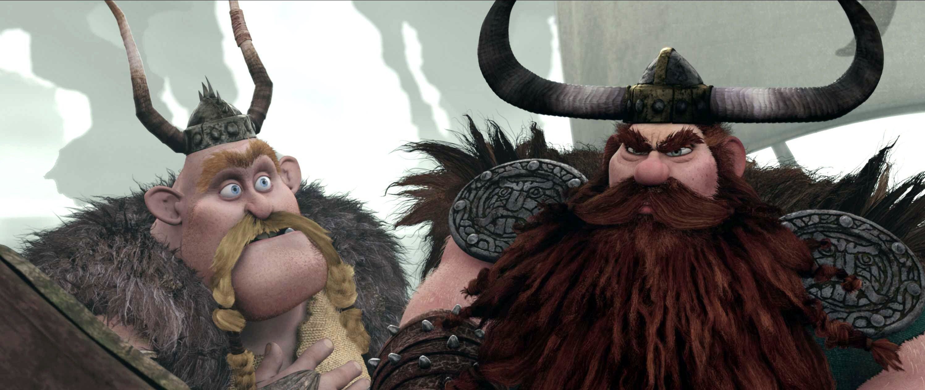 Two animated vikings discuss a battle plan