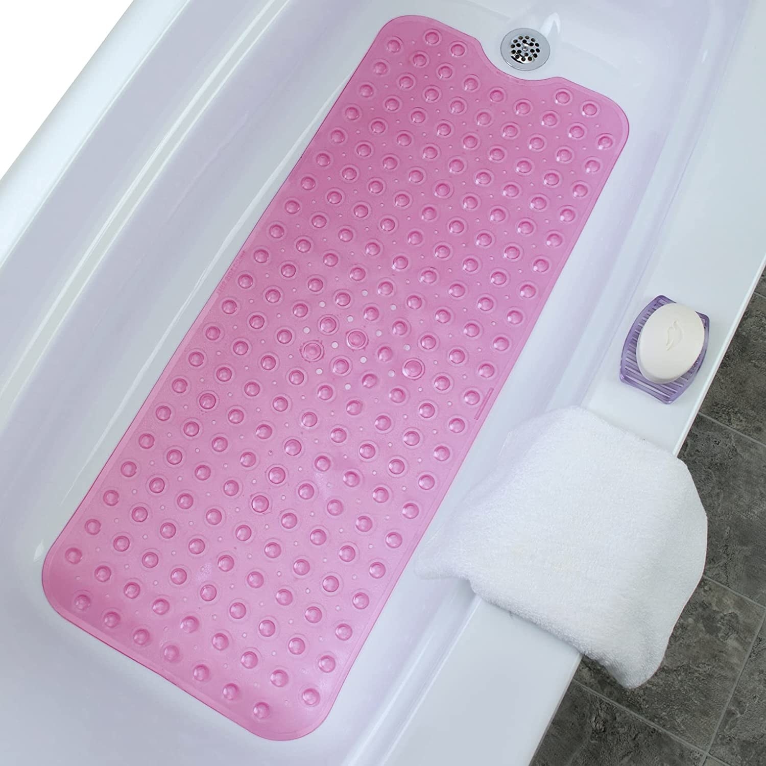 The mat in the bottom of a bathtub