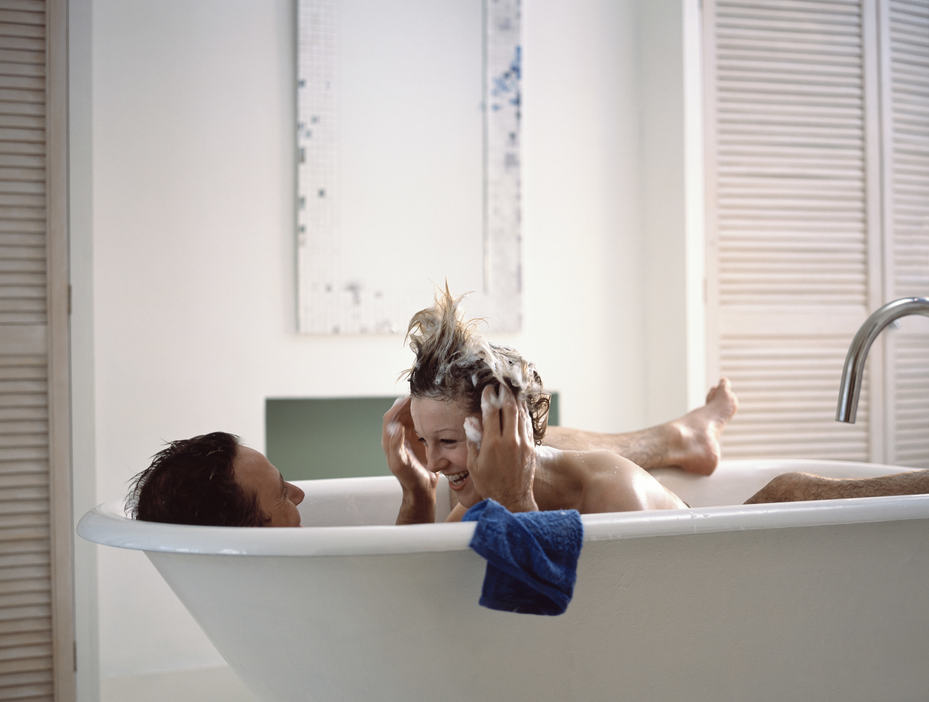 a couple in a bath together