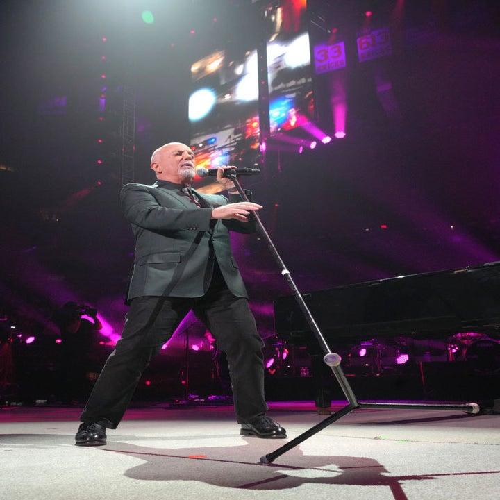 Billy Joel performing onstage at Madison Square Garden