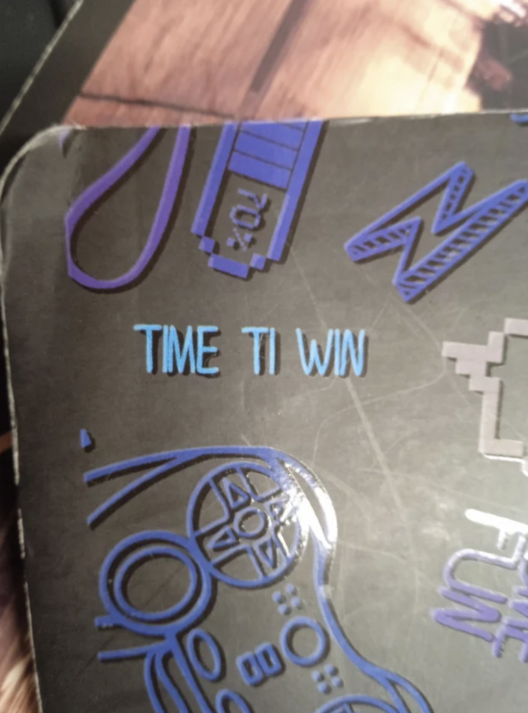 Notebook that reads, &quot;TIME TI WIN&quot;
